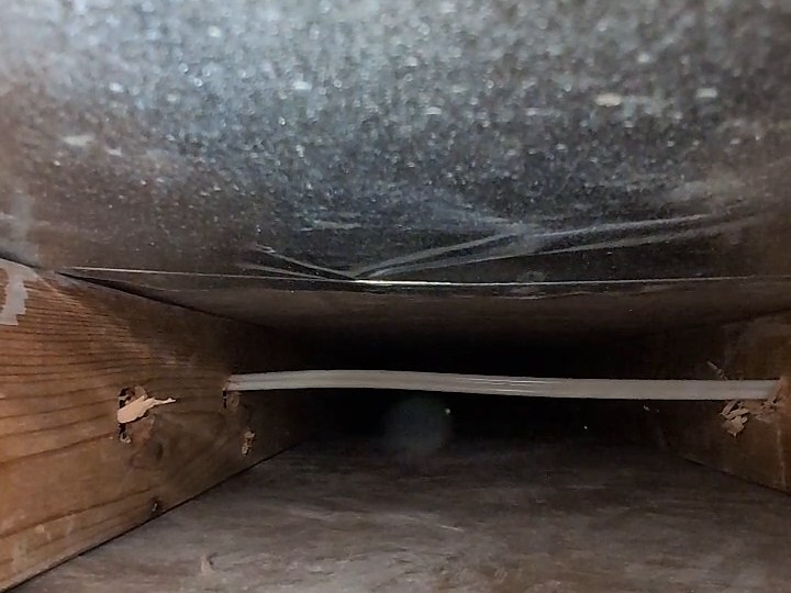 The same cable and duct after cleaning, with the dust clumps gone